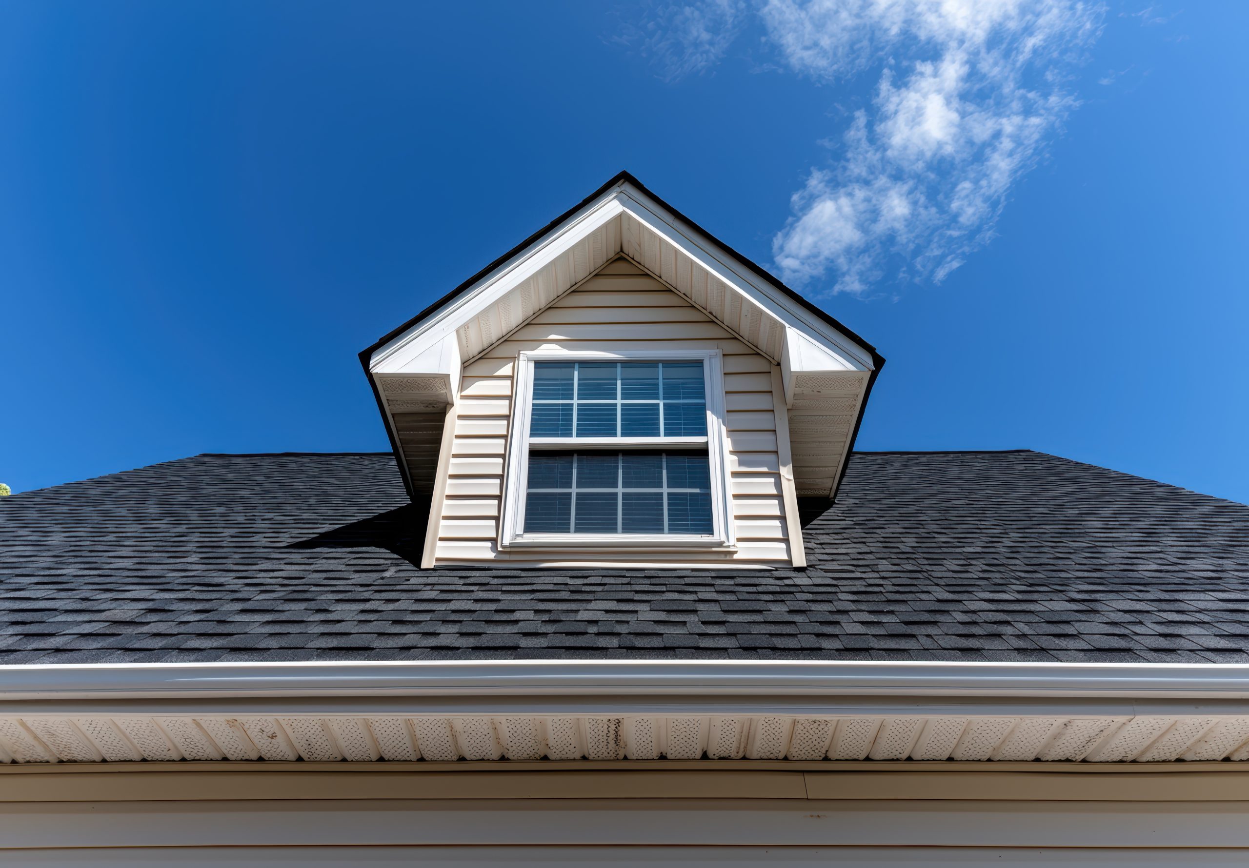 dormer window on a newly built house roof photo